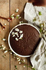 brownie pie on wooden surface