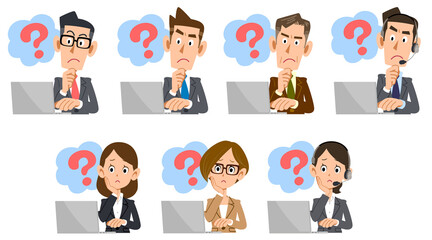 ノートパソコンを使いながら疑問を感じるスーツを着た男女
