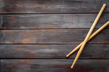 Top view of drum sticks with space for text. Music background