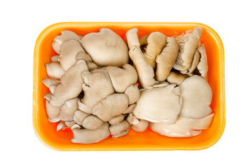 Fresh raw oyster mushrooms in package on white background