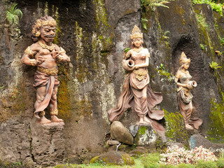 Fototapeta na wymiar The ancient Gunung Kawi Stone Shrines in Bali, Indonesia. They are all carved into the mountain