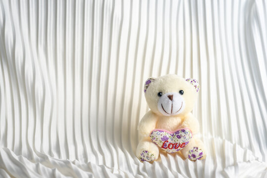 Detailed picture of childs bear stuffed toy