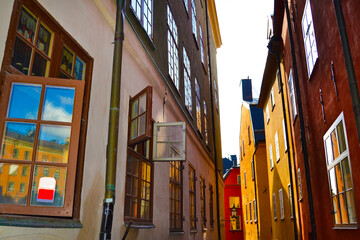 Obraz premium Narrow street with colorful buildings in the Old Town (Gamla Stan), Stockholm center, Sweden