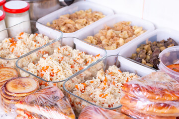 Lunch boxes with food ready to go for work or school, ahead meal preparation or dieting concept. Ready to eat.