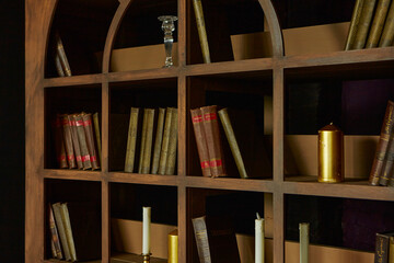 interior of the office. A shelf of books stands against the wall
