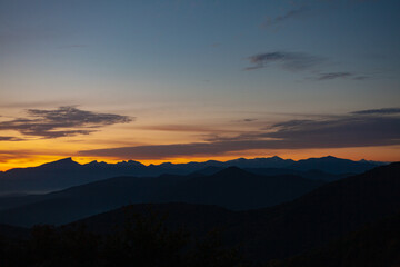 Scenic view of Mountains against sky during sunrise. Majestic sunrise over the mountains