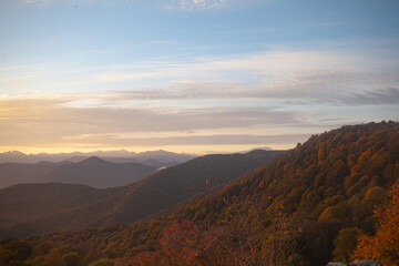Scenic view of Mountains against sky during sunrise. Majestic sunrise over the mountains