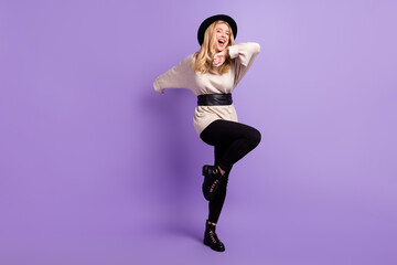 Full length photo of joyful happy charming lady dance enjoy closed eyes isolated on purple color background