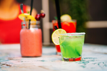 Exotic cocktails, fresh cold alcohol drinks at summer