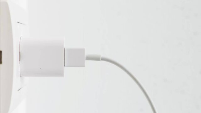 Hand of Electrical Appliances He was pulling the plug. Out of the plug. In his office during work hours. Energy Saving Concepts and Technologies