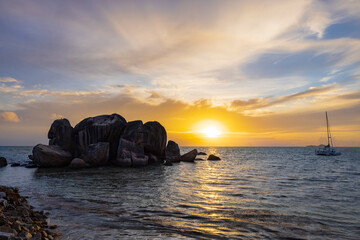 Naklejka na ściany i meble Sunset view from Les Rochers on the southern coast of Praslin Island in the Seychelles