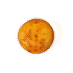 Muffin American version of the cupcake isolated on a white background. Top view