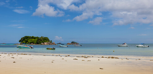 Fototapeta na wymiar View of Chauve Souris Relais island from Cote D'or beach on Praslin Island, Seychelles