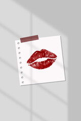 Red lipstick kiss on notepaper with natural light vector