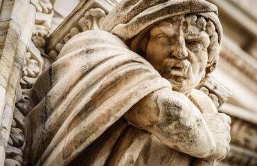 Obraz premium Main Christian Catholic church on Piazza di Duomo in center of Milan,Italy.Main tourist landmark in Lombardia,Milano.Ancient Italian cathedral built from white marble stone