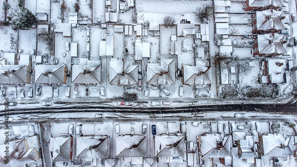 Wall mural aerial photo of drone footage of ipswich following heavy snowfall from storm darcy in february 2021