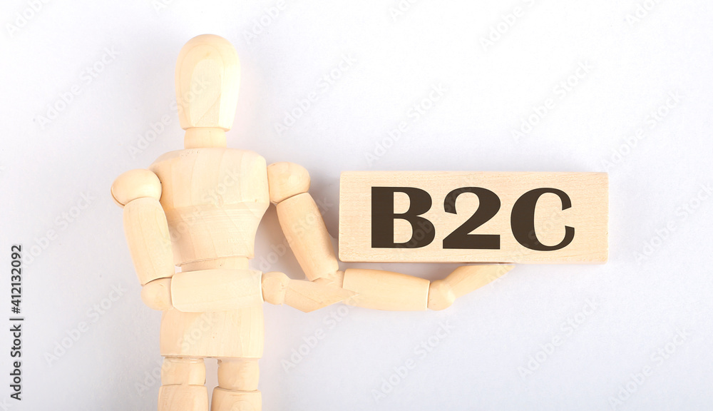 Poster wooden man shows with a hand to block with text b2c