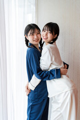 Naklejka premium パジャマの女性2人