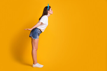 Full length body size photo portrait of woman wearing headband t-shirt shorts kissing empty space...