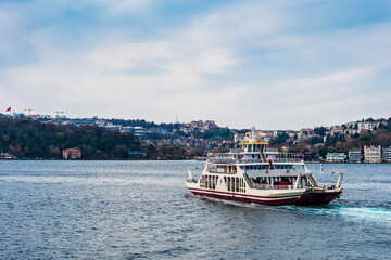 Ferryboat is running between two sides of Bosphorus in Istanbul