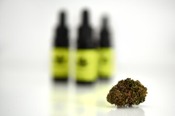 Bottles of cannabis medicine - 412137090