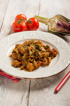 veal stew with hartichoke and tomato sauce