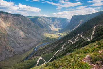 Panorama of the Katu Yaryk mountain pass and the valley of the river of Chulyshman. Altai Republic, Russia, beautiful summer day