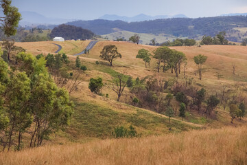 Fototapeta na wymiar Rolling hills rural countryside landscape near Rydal in the Blue Mountains National Park in NSW, Australia.