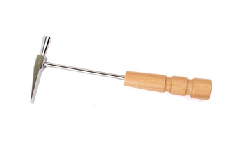 Hammer for tuning kalimba isolated on white background. Music concept.