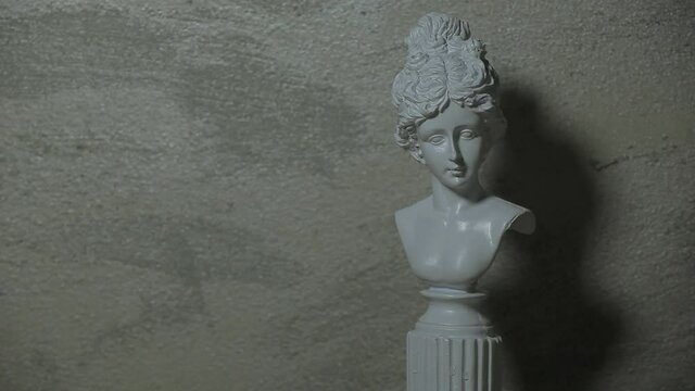 footage of sculpture sharp wall background 