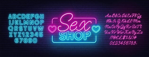 Sex Shop neon sign on brick wall background. Pink and blue neon alphabets. - obrazy, fototapety, plakaty