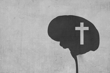 Human brain with Christian cross