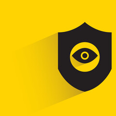 security shield and eye scanner drop shadow on yellow background