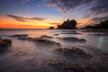 Tanah Lot Temple in sunset time, the most famous temple on the sea at Bali island, Indonesia