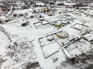 Aerial view of the countryside with the snow at winter time (drone image).  Saburb of Kiev,Ukraine