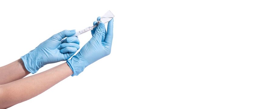 Doctor, researcher holds hands syringe in blue glove holding flu, measles, rubella or hpv vaccine and syringe with needle vaccination for human