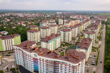 Aerial view of city residential area with high apartment buildings.