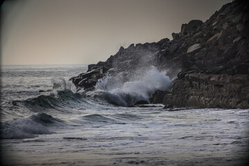 waves crashing on rocks