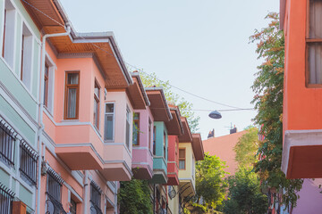 Fototapeta na wymiar The colourful apartment blocks on Kiremit Street in the authentic, multicultural Istanbul neighbourhood of Balat.