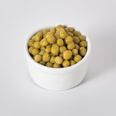 Vegetable, peas in white bowl.