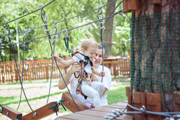 Young dad teaches his daughter to overcome obstacles