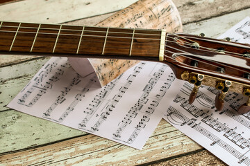 guitar and music sheet, guitar and music notes