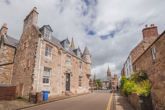 The quaint traditional village of Falkland, a popular filming location in Fife, Scotland on a sunny summer day.