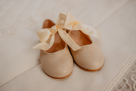 little child shoes for a baptism 