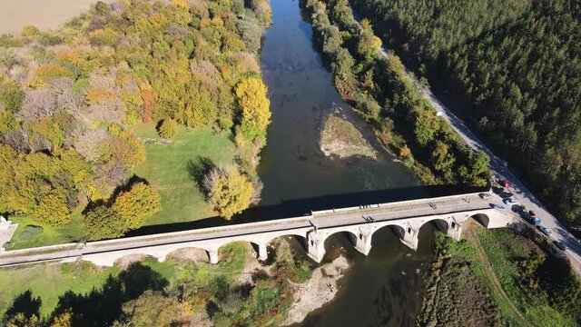 Aerial view of Nineteenth-century bridge over the Yantra River, known as the Kolyu Ficheto Bridge in Byala, Ruse region, Bulgaria