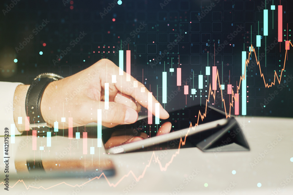 Poster multi exposure of abstract financial graph and hand working with a digital tablet on background, fin