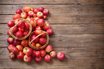 red apples on old wooden background