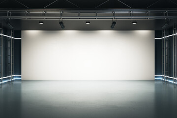Big blank light screen instead of wall with projectors in empty industrial style hall room with...