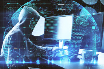 Cyber security concept with faceless hacker silhouette working with laptop and computer and abstract digital screen with glowing world map. Double exposure.