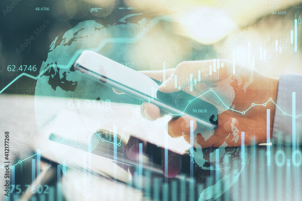 Poster Trader with smartphone in hand and digital screen with stock market chart and earth map. Double exposure.